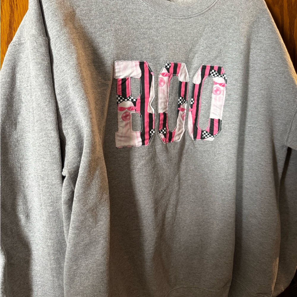 Gray Sweatshirt with Pink and Black 'BOO' Design
